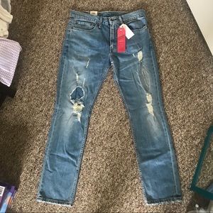 Ripped Mens Levi’s jeans.